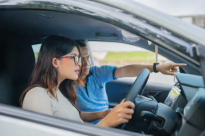 Learner Driver - Lady with Instructor Learner Driver - Lady with Instructor